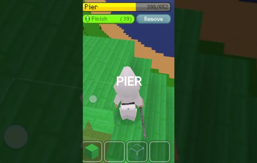 Third-person game view of a white-hooded character standing on a green pier platform