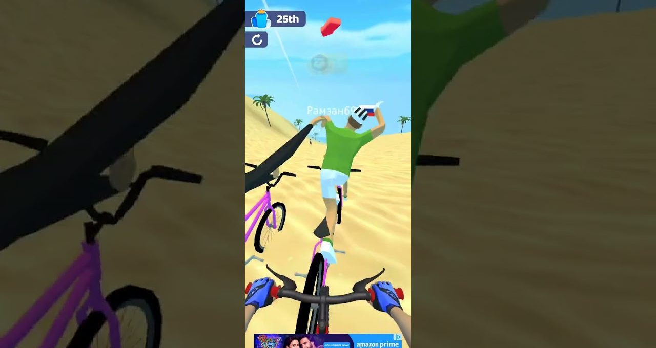 First-person view of biking behind a rider on sandy desert course with palm trees