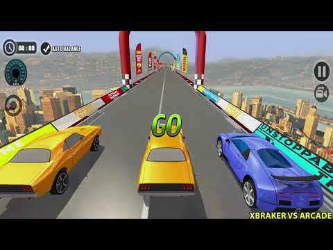 Three colorful race cars lined up on elevated city racetrack with "GO" sign