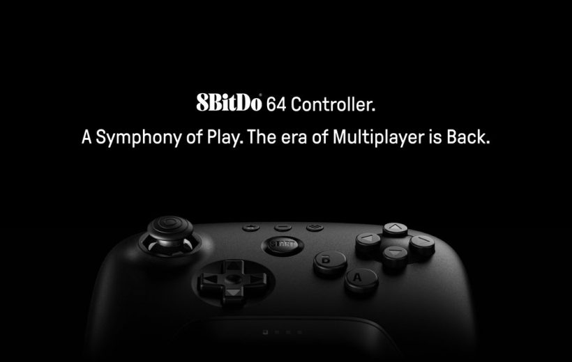 Black 8BitDo 64 wireless game controller shown against dark background with slogan above