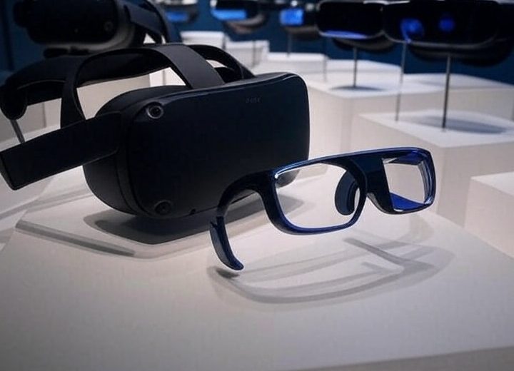 Row of black virtual reality headsets and blue smart glasses displayed on pedestals