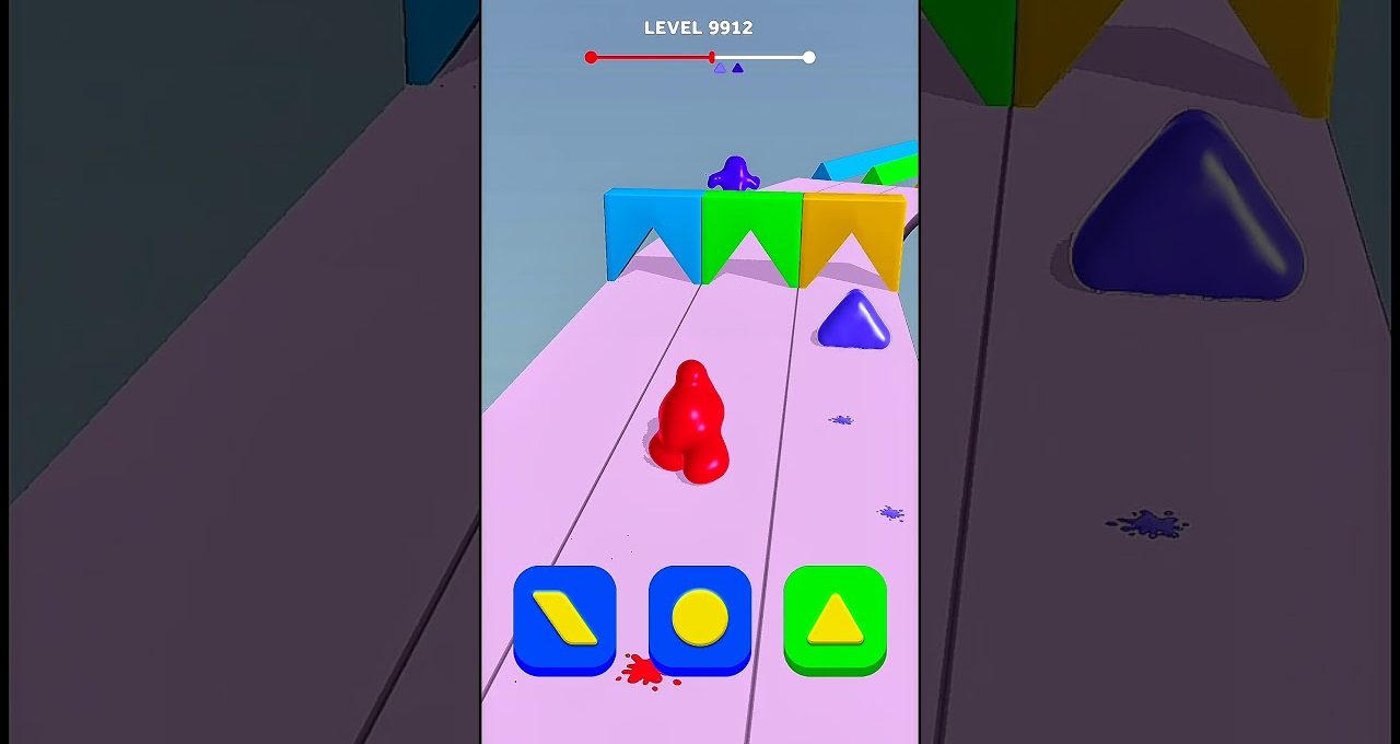 Colorful mobile game level showing a red blob character navigating triangular obstacles.