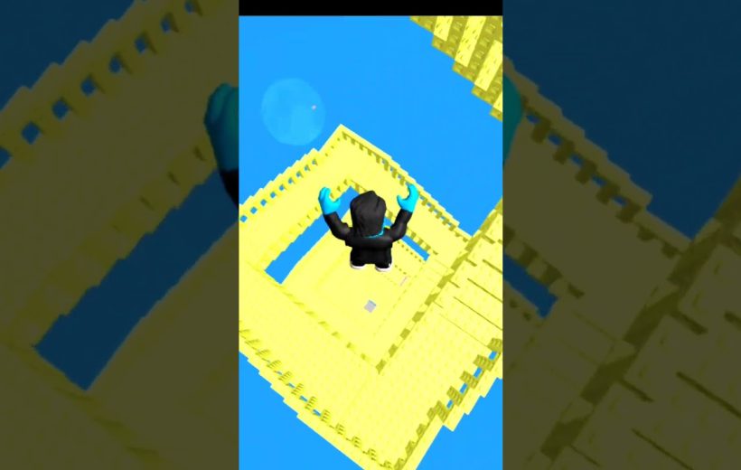 Avatar in black falling down a spiraling yellow block tower against blue sky