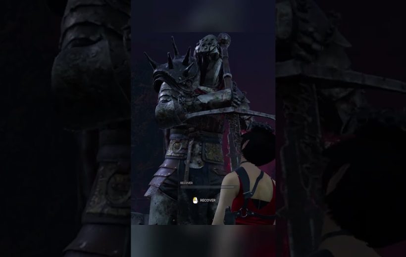 Armored, spiked statue wielding a sword looming over a kneeling woman player.