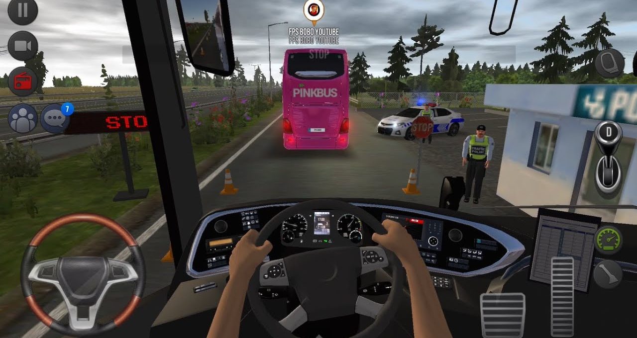 Driver view inside bus approaching pink coach at police roadside checkpoint with officer