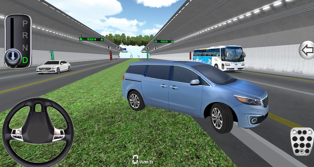 Blue minivan parked on grassy median beside multi-lane tunnel road with traffic controls