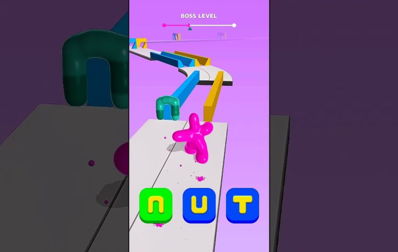 Colorful mobile game level showing a pink blob character navigating a winding platform.