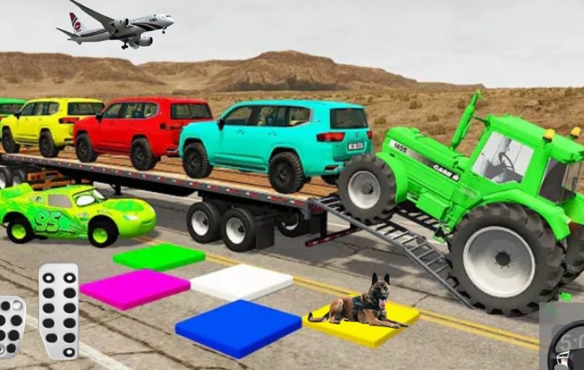 Bright green tractor loading colorful SUVs onto flatbed trailer on desert road with dog