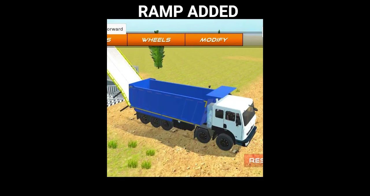 Blue dump truck parked beside a ramp in a grassy dirt field scene
