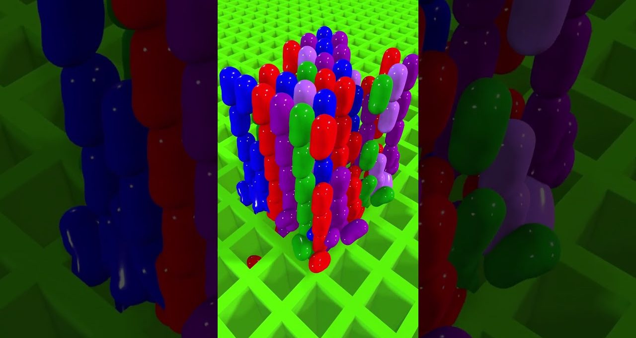 Colorful glossy capsule-like figures clustered on a bright green grid platform.