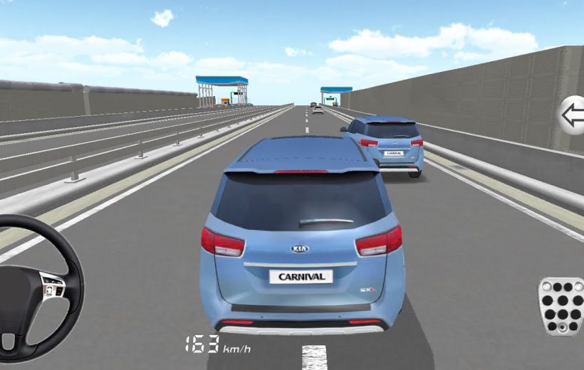 Blue Kia Carnival driving on highway with another SUV and steering wheel controls