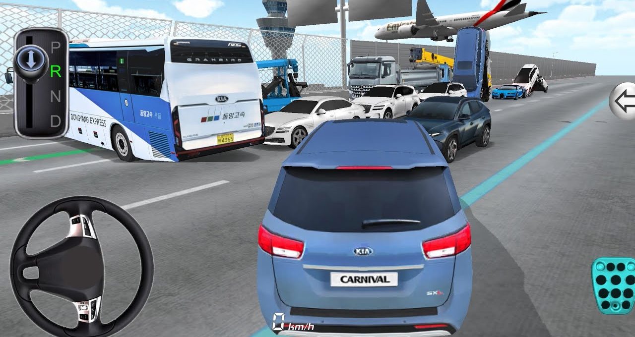 Blue Kia Carnival driving through heavy multi-vehicle traffic near an airport runway.