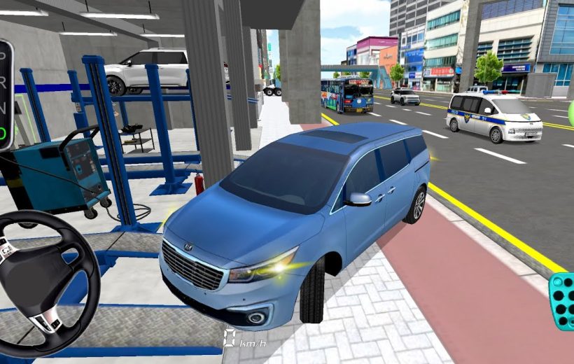 Blue minivan parked partly on sidewalk outside garage with city traffic nearby