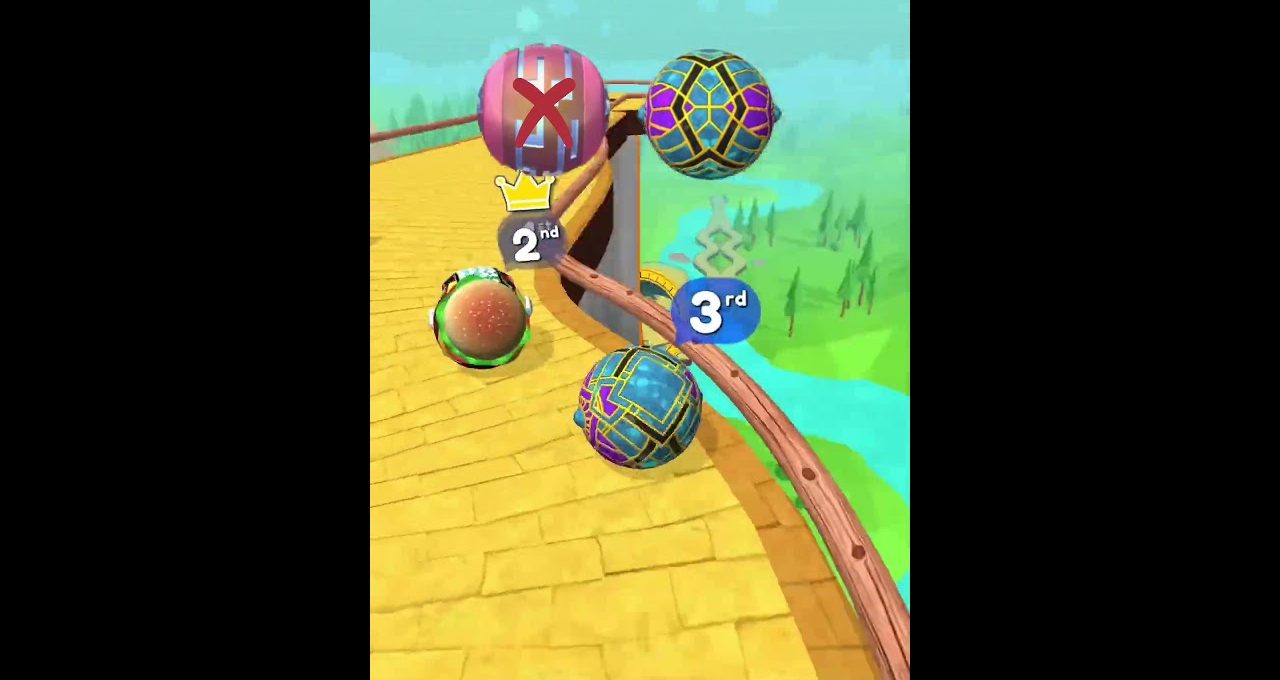 Three colorful rolling balls racing along a curved yellow track with position markers