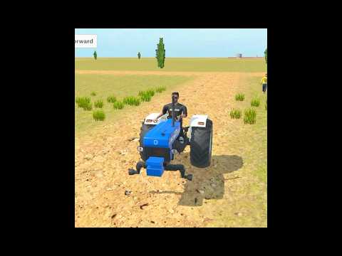 Man driving blue tractor across dry field with sparse grass and distant trees