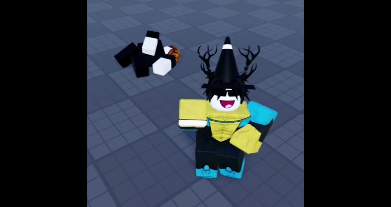 Blocky game avatar wearing a tall cone hat and antlers, smiling on tiled floor