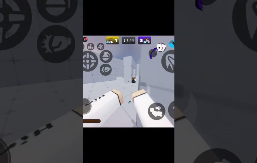 First-person view of a mobile shooter game arena with on-screen controls visible