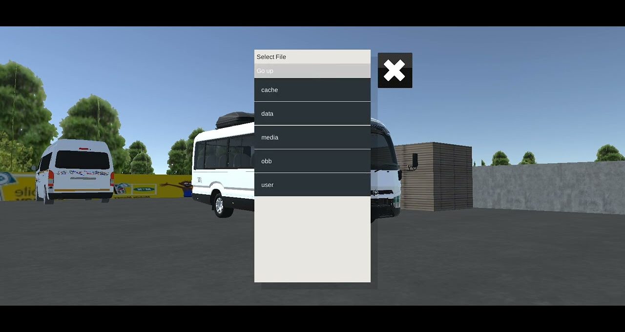 Small white minibuses parked in a lot with a file selection menu overlay