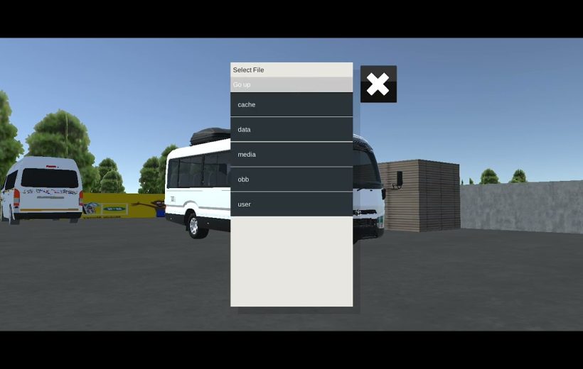 Small white minibuses parked in a lot with a file selection menu overlay