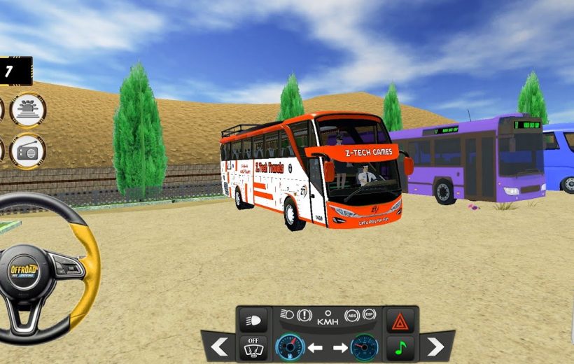 Orange and white tour bus parked beside purple buses in a desert bus lot