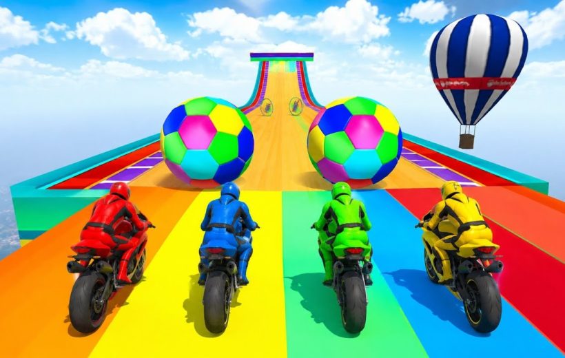 Four colorful motorcyclists racing up a rainbow track toward giant multicolored balls