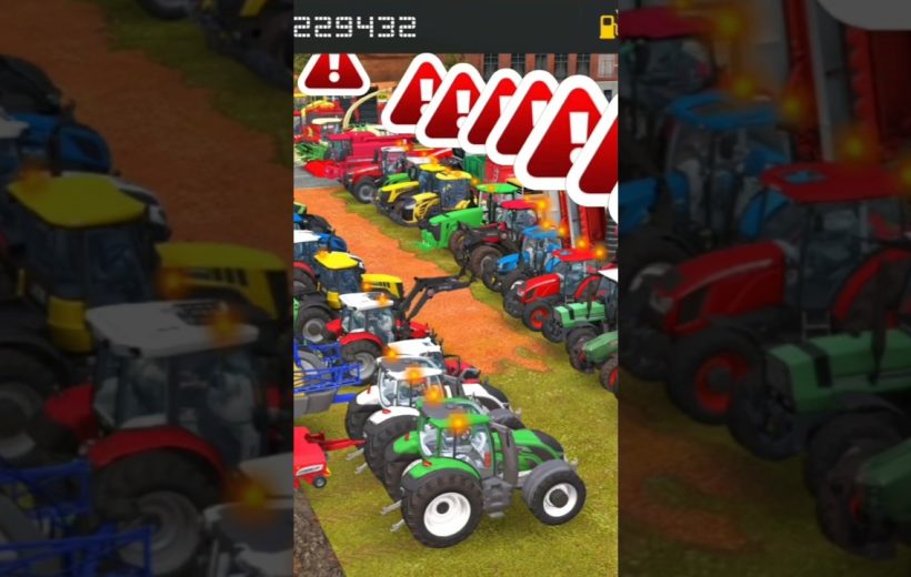 Rows of colorful tractors parked on grass in a crowded farm equipment lot
