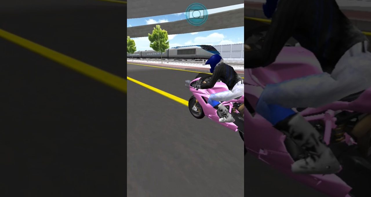 Person in blue helmet riding a pink sport motorcycle on a city road