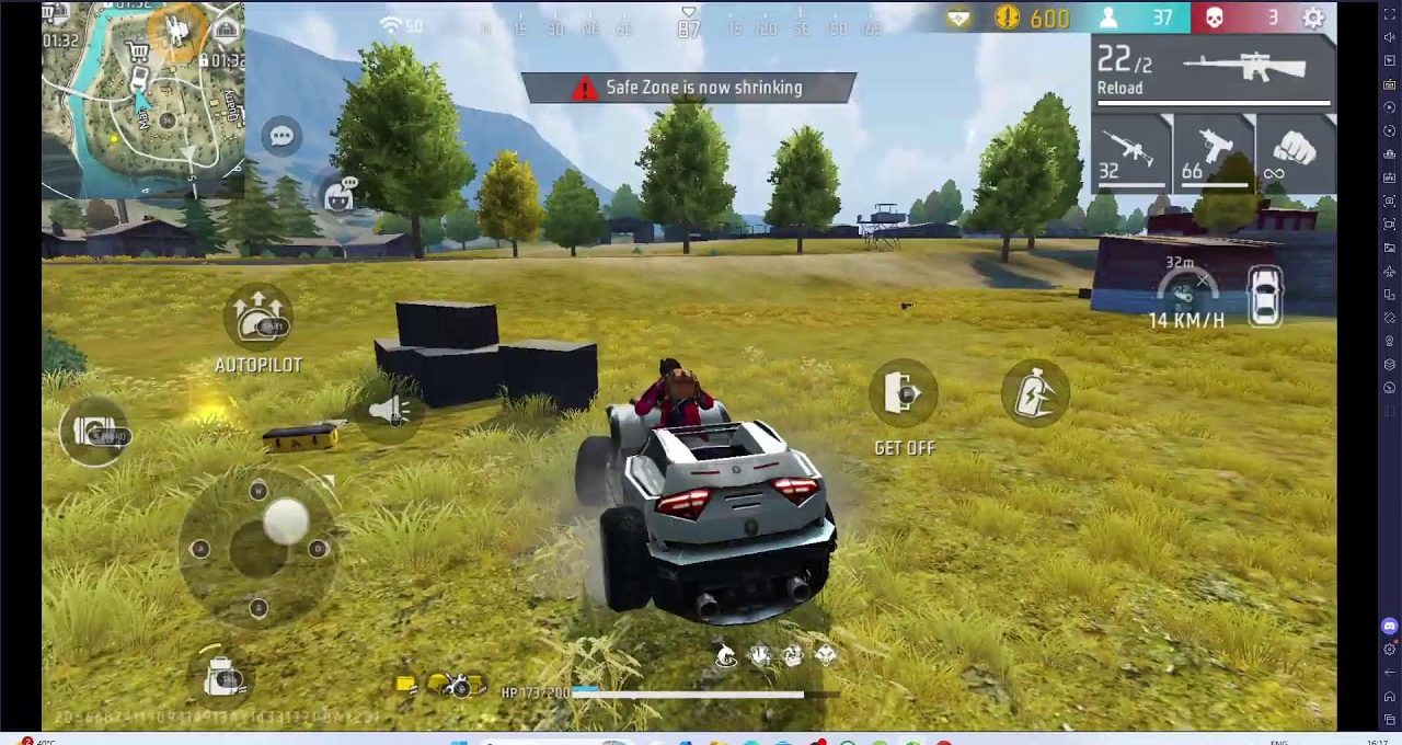 Player driving an off-road vehicle across grassy field in a battle royale game