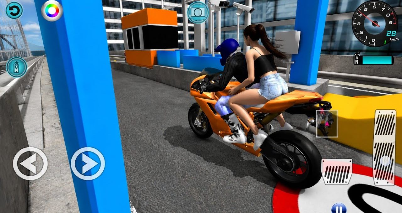 Two people on an orange sport motorcycle passing a toll booth on city bridge.
