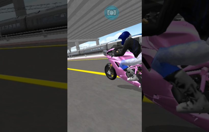Rider in blue helmet leaning over a pink sport motorcycle on highway underpass