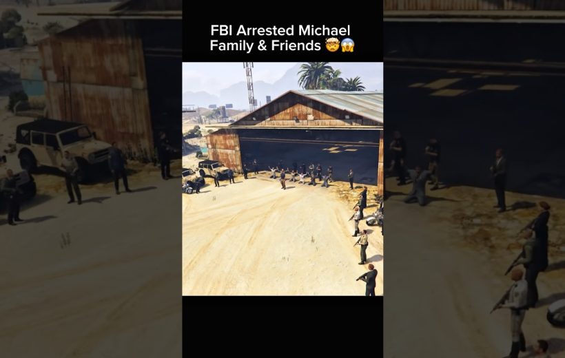 Agents surround a barn while suspects kneel and raise hands during an arrest scene