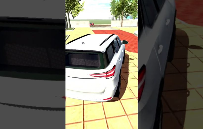 White SUV parked on tiled driveway near trees and a red circular pavement.