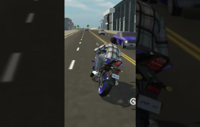 Rider wearing plaid shirt riding a blue sport motorcycle down a city street