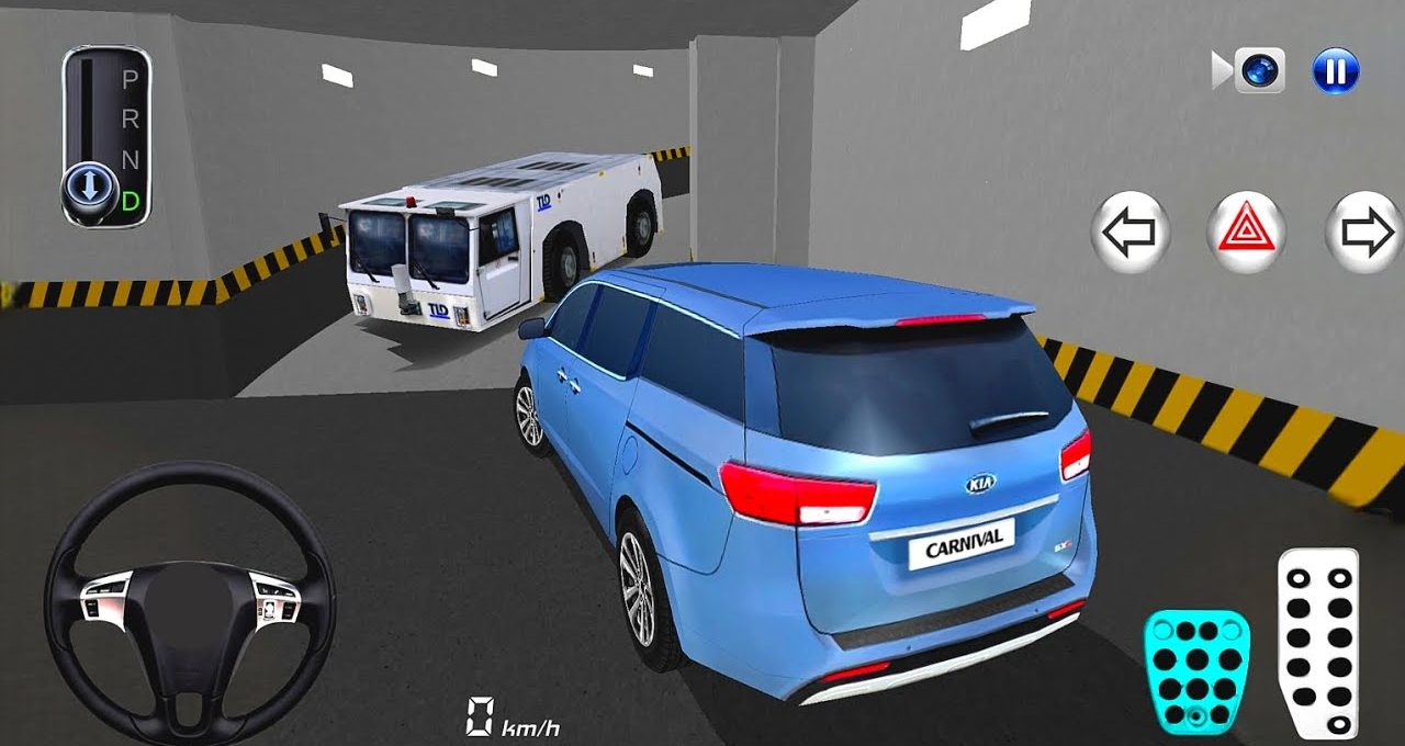 Blue Kia Carnival reversing in underground garage toward approaching white tow tractor