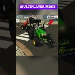 Two players driving green and red tractors in a city street multiplayer game