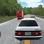 Rear view of a white car driving on a two-lane road through trees