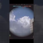 Sniper scope view aimed at a distant aircraft against cloudy blue daytime sky