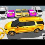 Shiny gold SUV parked in showroom surrounded by colorful service vans and attendants