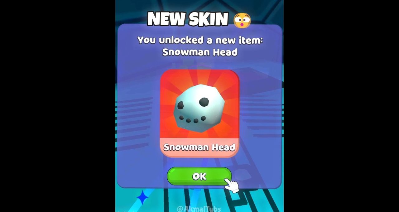 Game screen showing unlocked item "Snowman Head" with OK button and cursor.