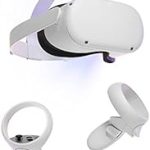 White standalone virtual reality headset with two motion controllers and charging dock