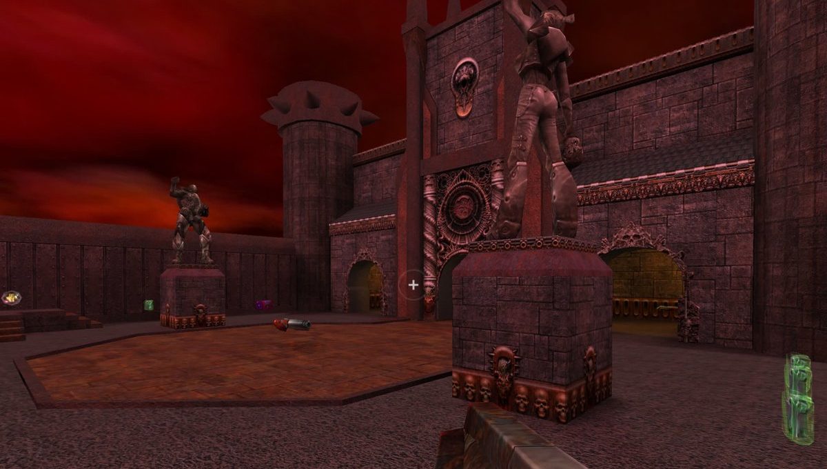Dark red gothic courtyard with statues, arches, and a weapon on the ground