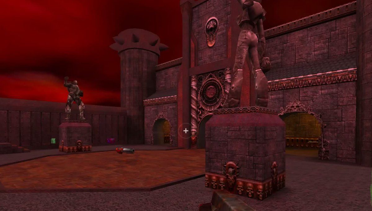 Dark red castle courtyard with gothic statues and arched stone doorways, game HUD visible