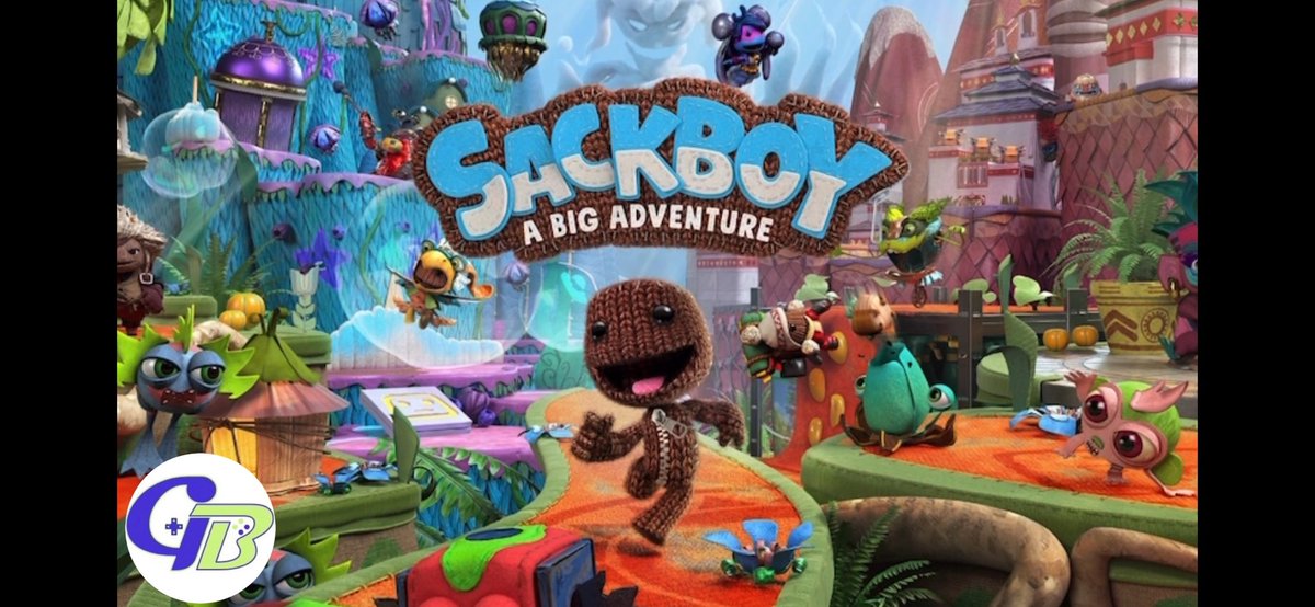 Sackboy character joyfully running through colorful handcrafted platforming world with creatures
