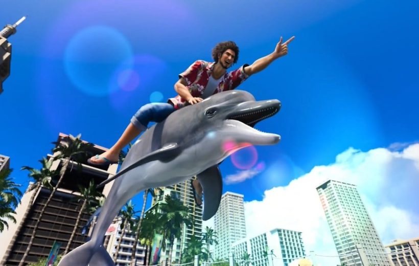 Man in Hawaiian shirt joyfully riding a large dolphin statue above cityscape.
