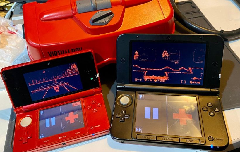 Two open Nintendo 3DS consoles showing retro red-tinted game screens beside a Virtual Boy.